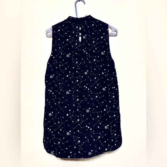 Emma & Olivia Tops - LAST CHANCE- Star blouse with triangle cutout over throat area.